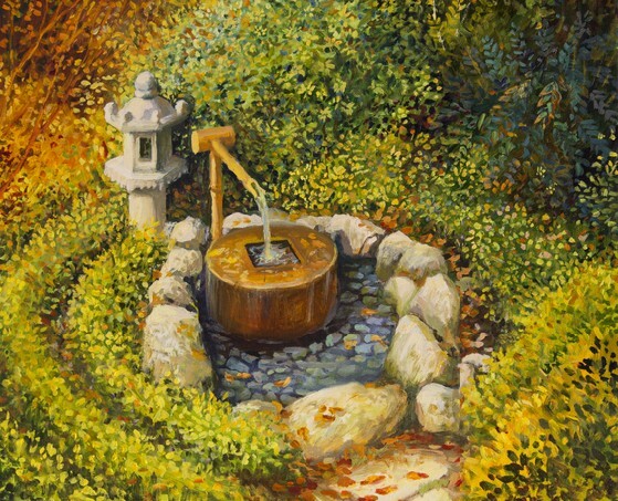 Traditional Japanese garden with a stone lantern and water basin